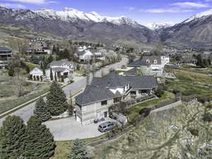 Aerial view of residential area featuring mountains