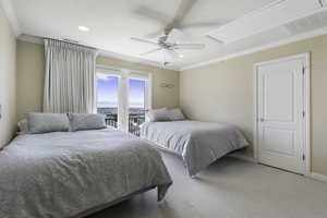 Carpeted bedroom featuring crown molding, access to exterior, and ceiling fan
