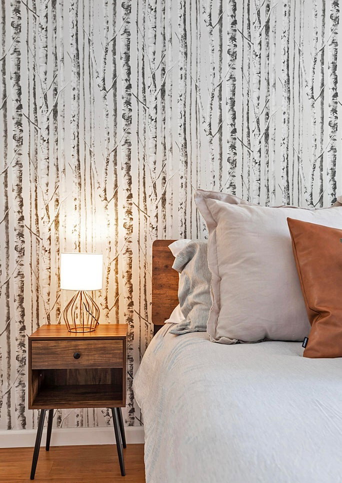 Bedroom with wood finished floors