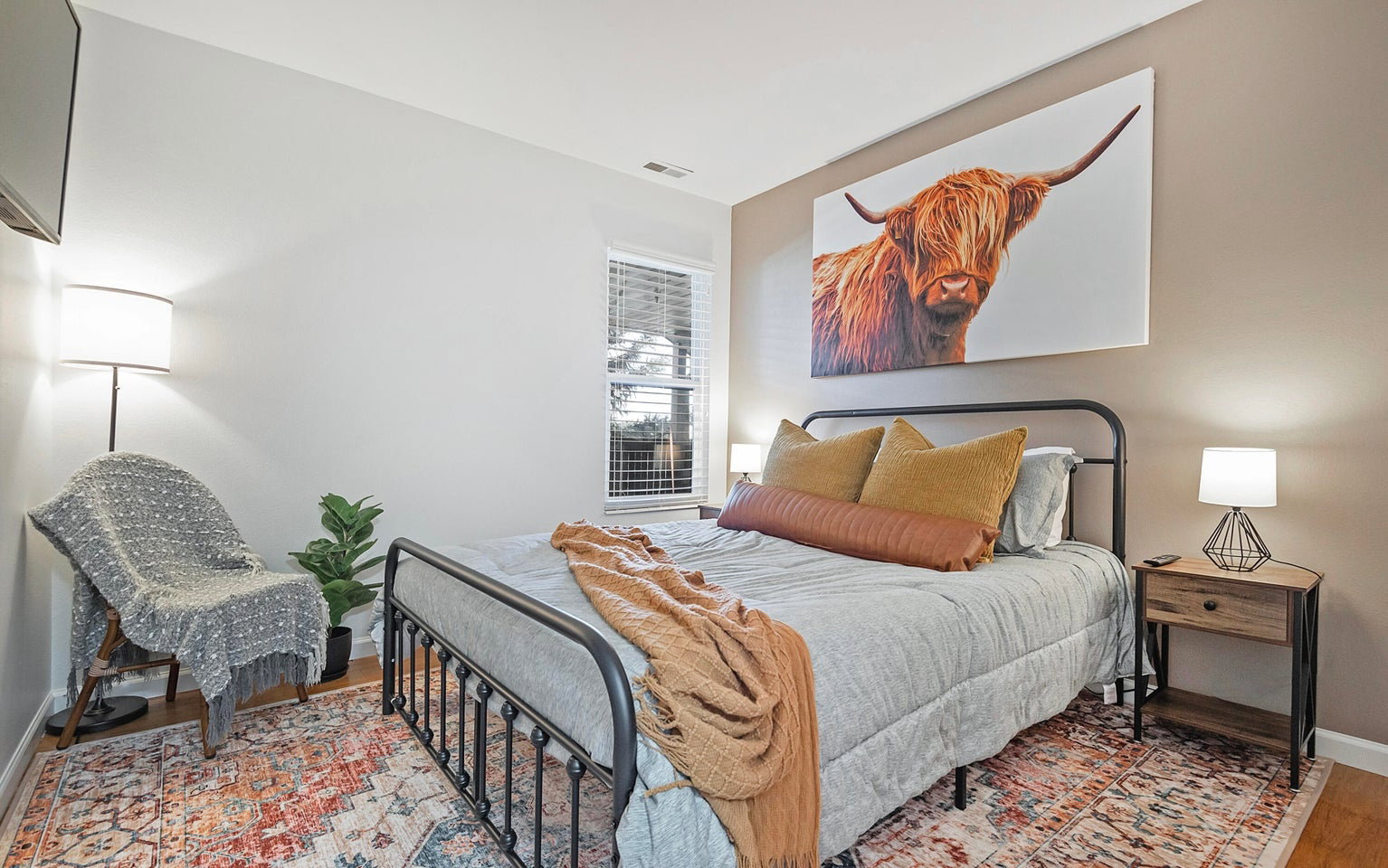 Bedroom featuring baseboards and light wood finished floors