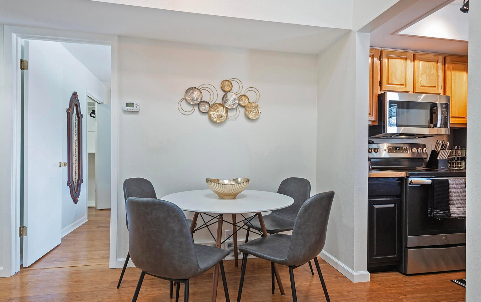 Dining room featuring baseboards and light wood-type flooring