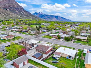 Aerial view of residential area featuring mountains
