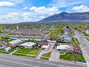 Aerial view of residential area with a mountainous background