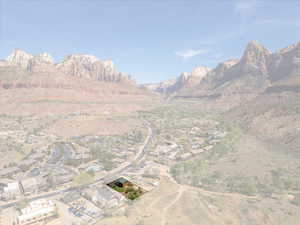 View of mountain backdrop with nearby suburban area