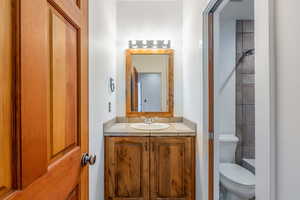 Bathroom featuring vanity and toilet