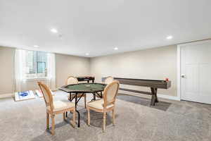 Game room featuring light carpet and recessed lighting