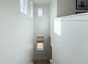 Staircase featuring healthy amount of natural light