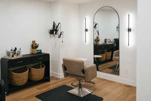 Office space with light wood finished floors and baseboards