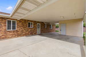 View of patio / terrace featuring an attached carport