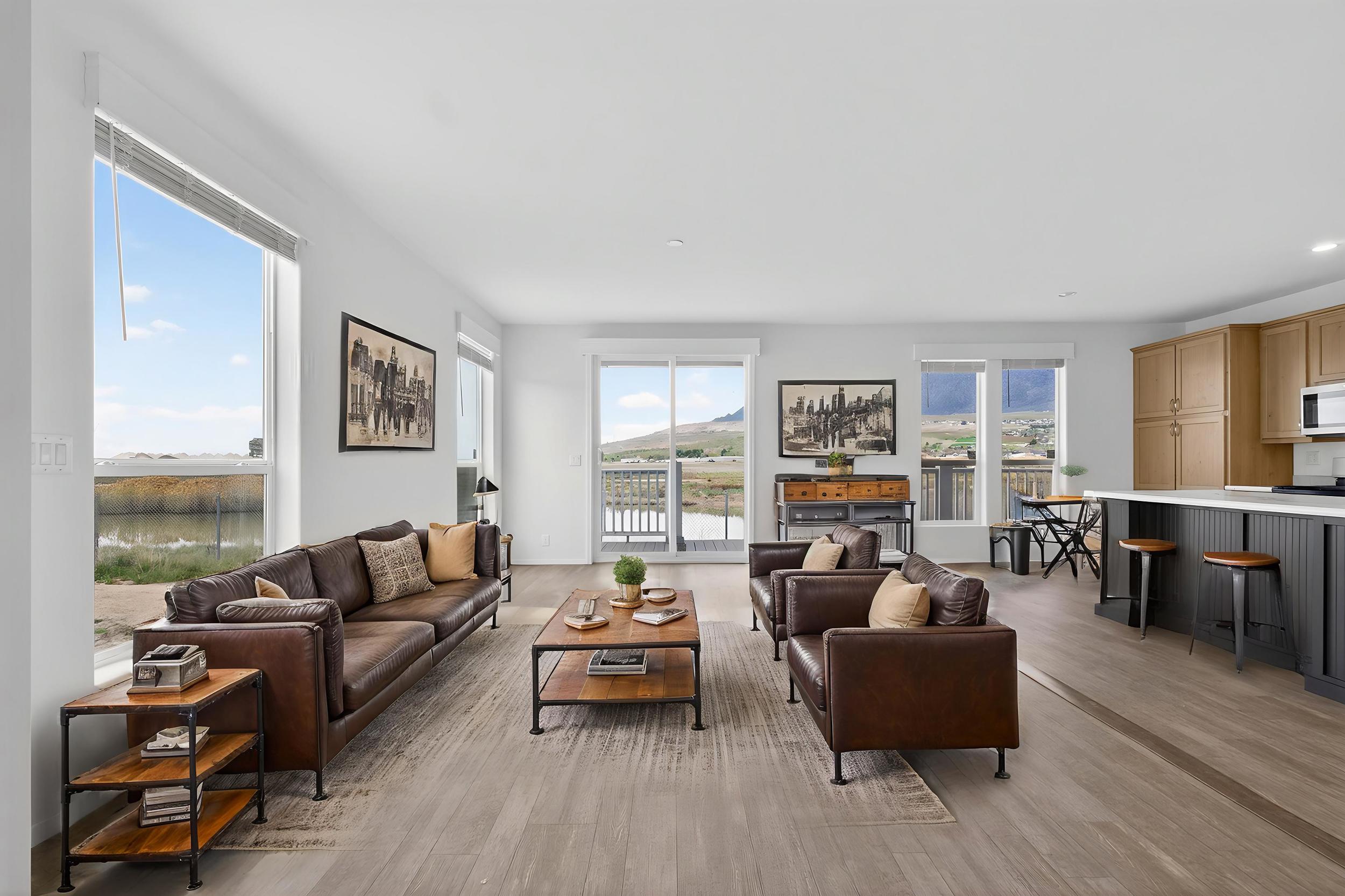 *Virtually staged* Living room featuring light wood-type flooring