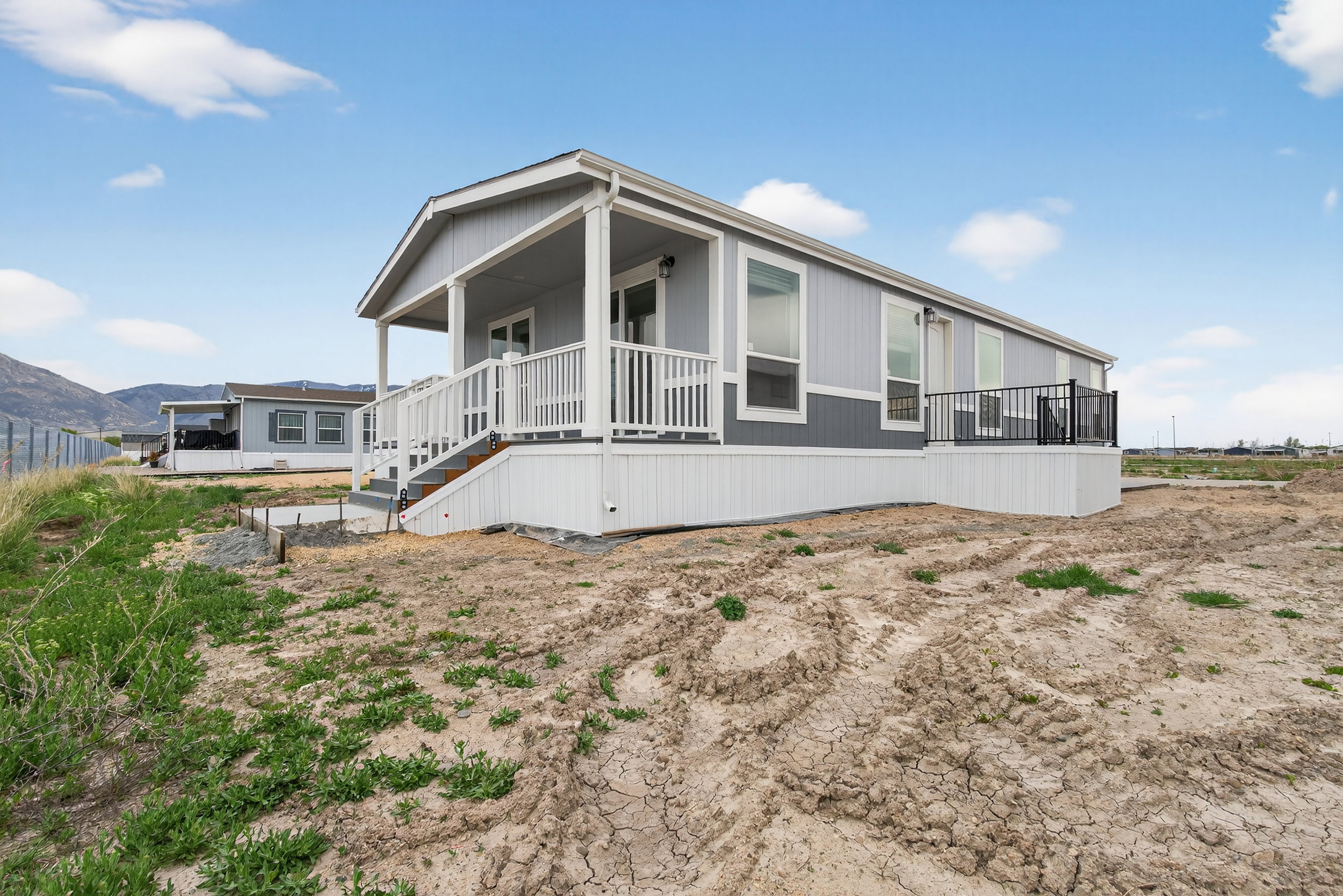View of front of home featuring covered porch and a mountain view