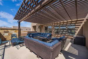 View of patio / terrace with a pergola and outdoor lounge area