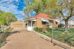 Fenced front yard and detached garage