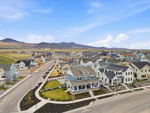 Aerial view of residential area featuring a mountain backdrop