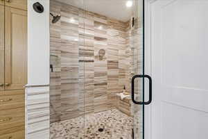 Bathroom featuring large walk in shower