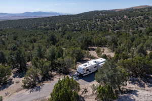 View from above of property featuring a mountainous background