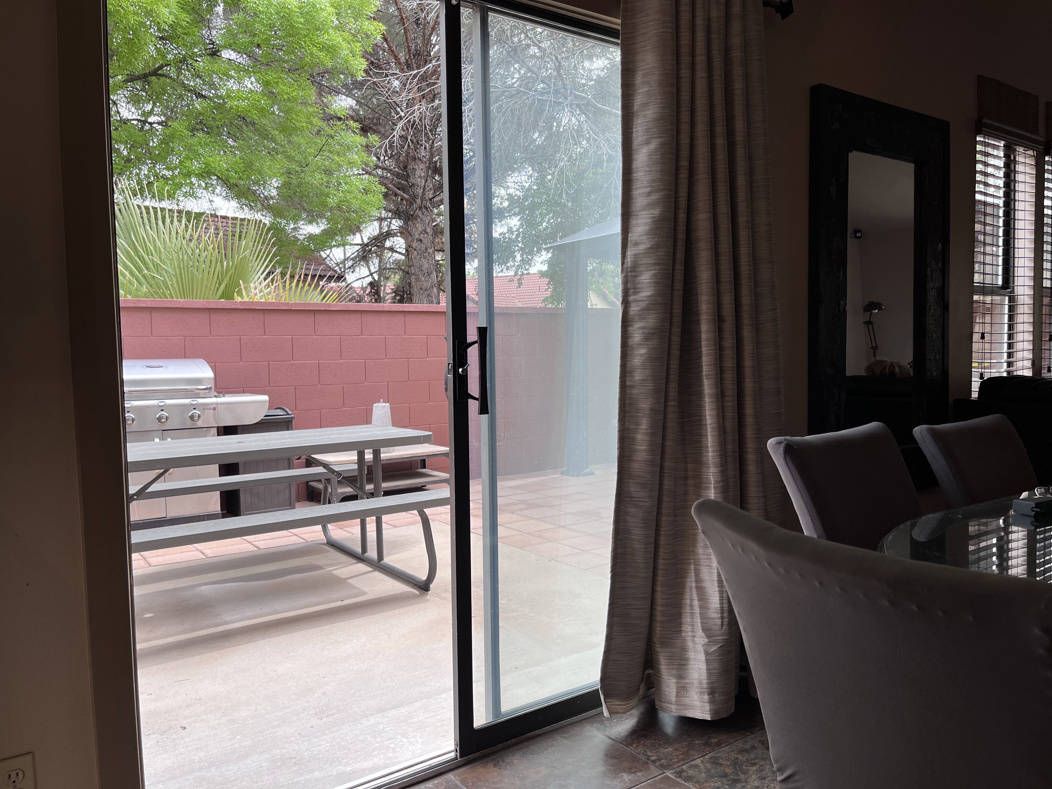 Doorway to outside featuring healthy amount of natural light
