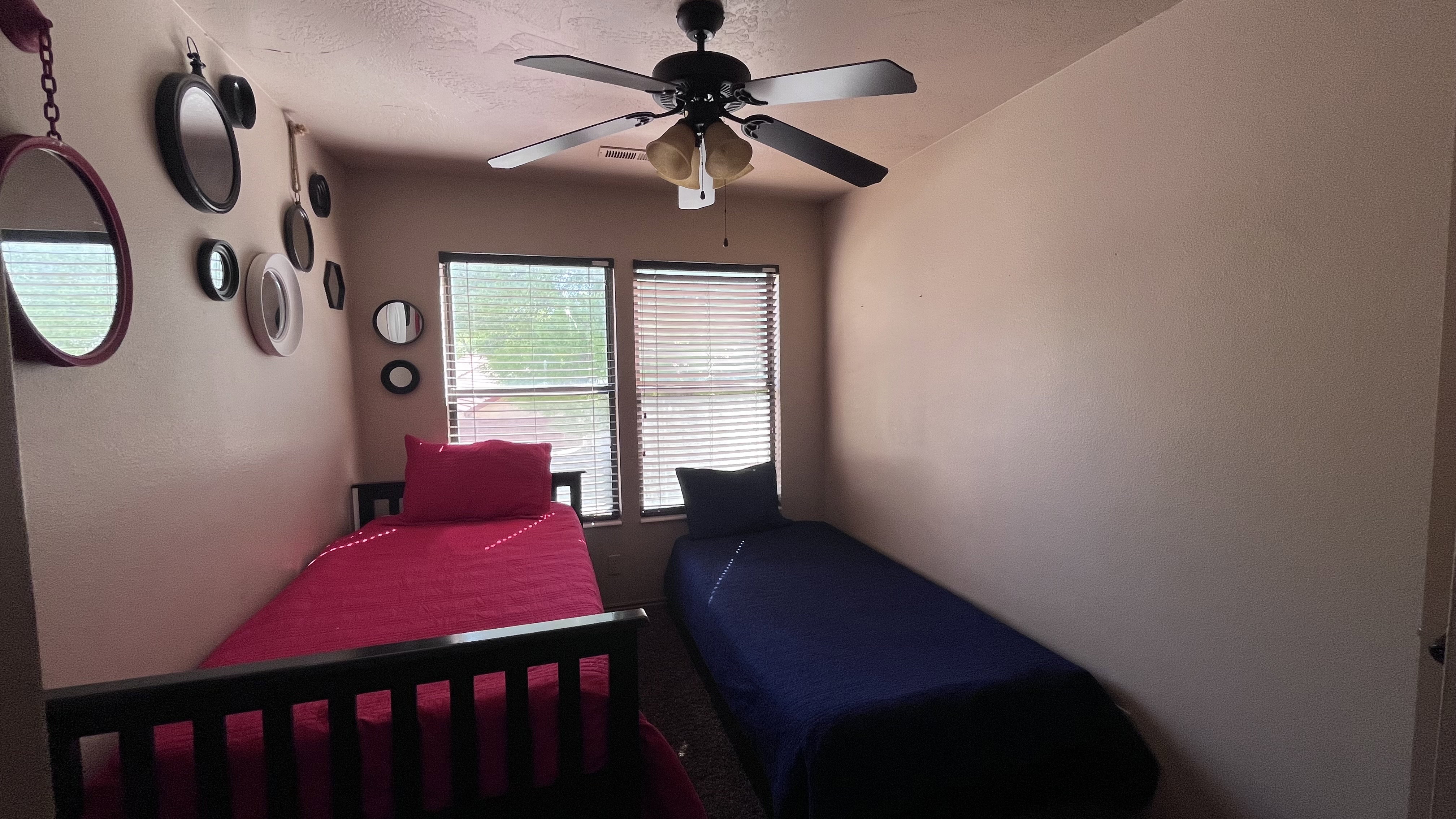 Bedroom featuring a ceiling fan