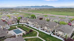 Aerial view of residential area with a mountainous background