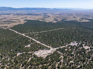 Aerial view of property's location with mountains
