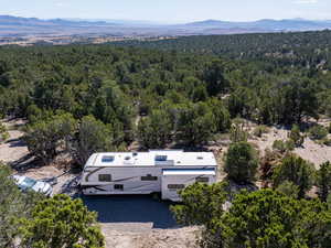 View of subject property with mountains