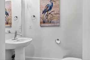 Half bathroom off of mudroom on main level