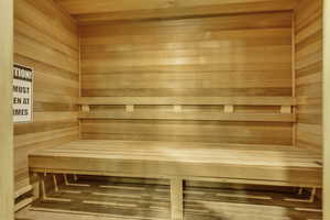 Relaxing Sauna / steam room with wooden walls and wood ceiling