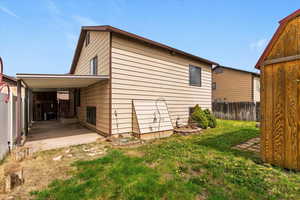 View of side of property featuring a patio