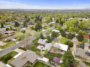 Aerial perspective of suburban area featuring a mountain backdrop