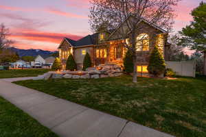 Traditional-style house featuring stone siding and a mountain view