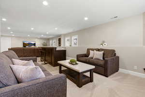 Living room featuring recessed lighting and baseboards