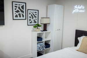 Bedroom featuring baseboards