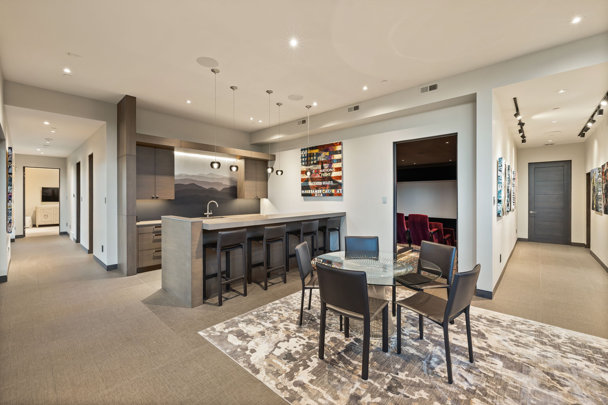 Dining space featuring light colored carpet and recessed lighting