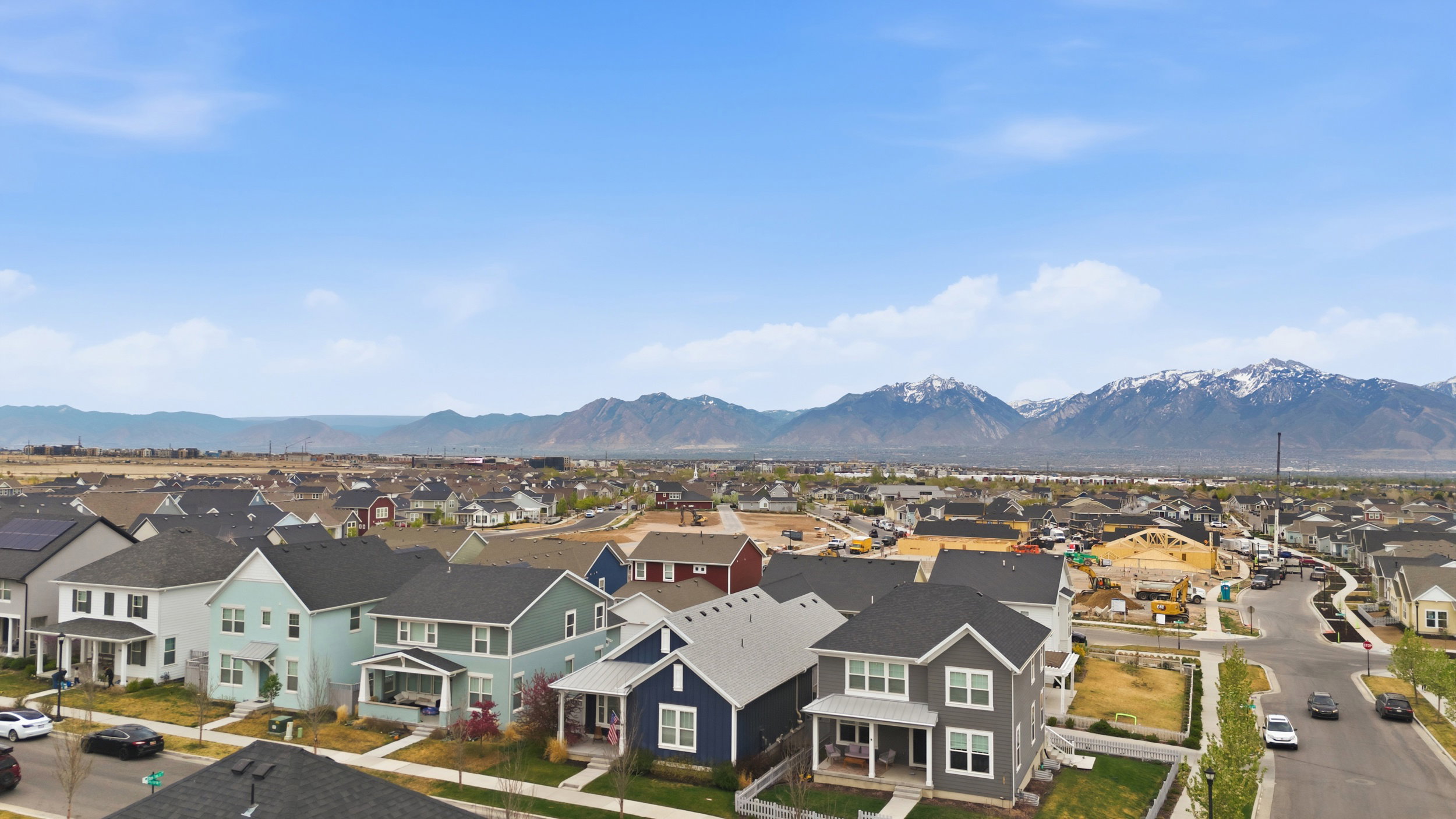 Aerial view of residential area with a mountain backdrop