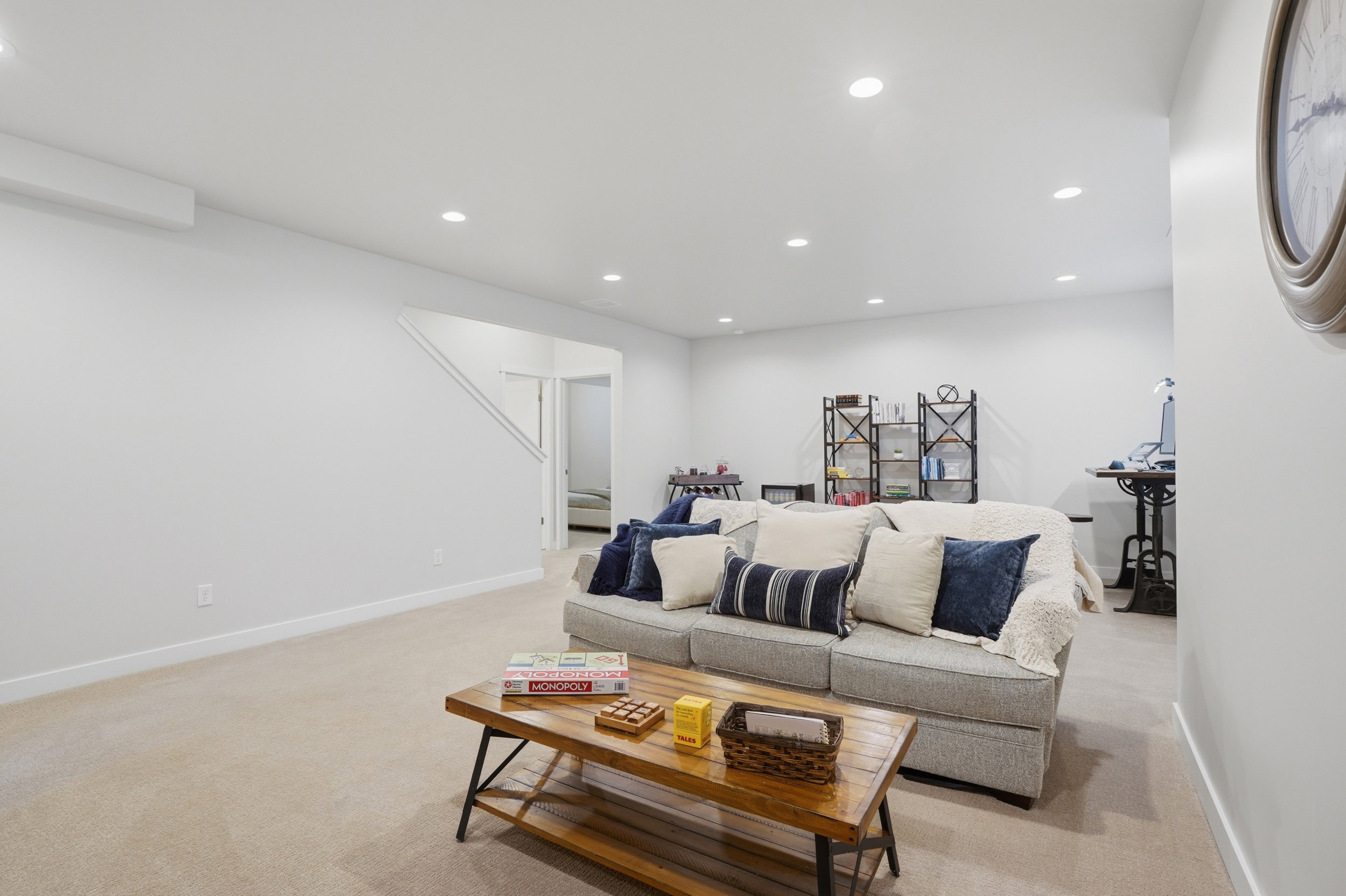 Living room featuring recessed lighting and light carpet