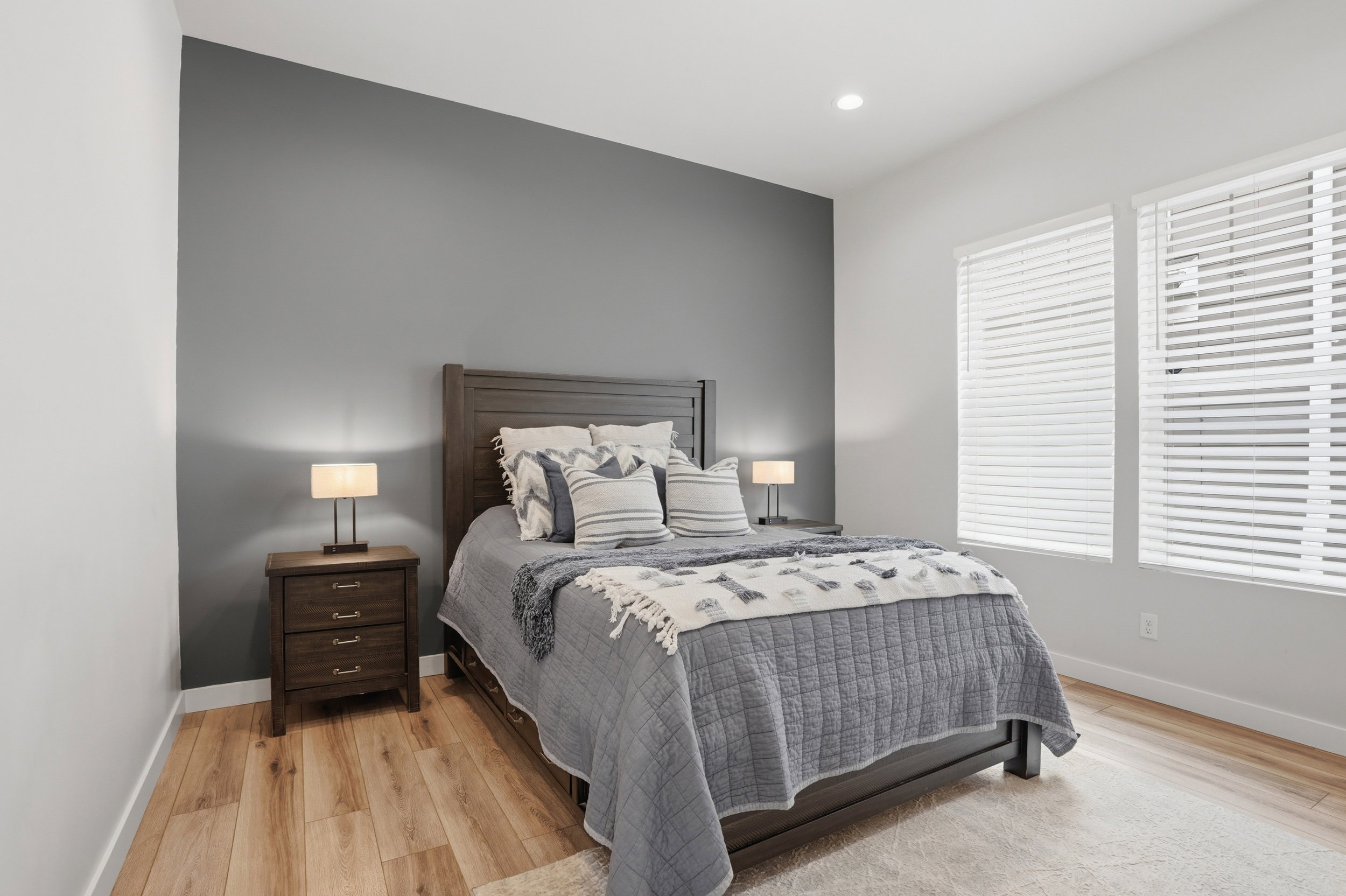 Bedroom with light wood-type flooring and recessed lighting
