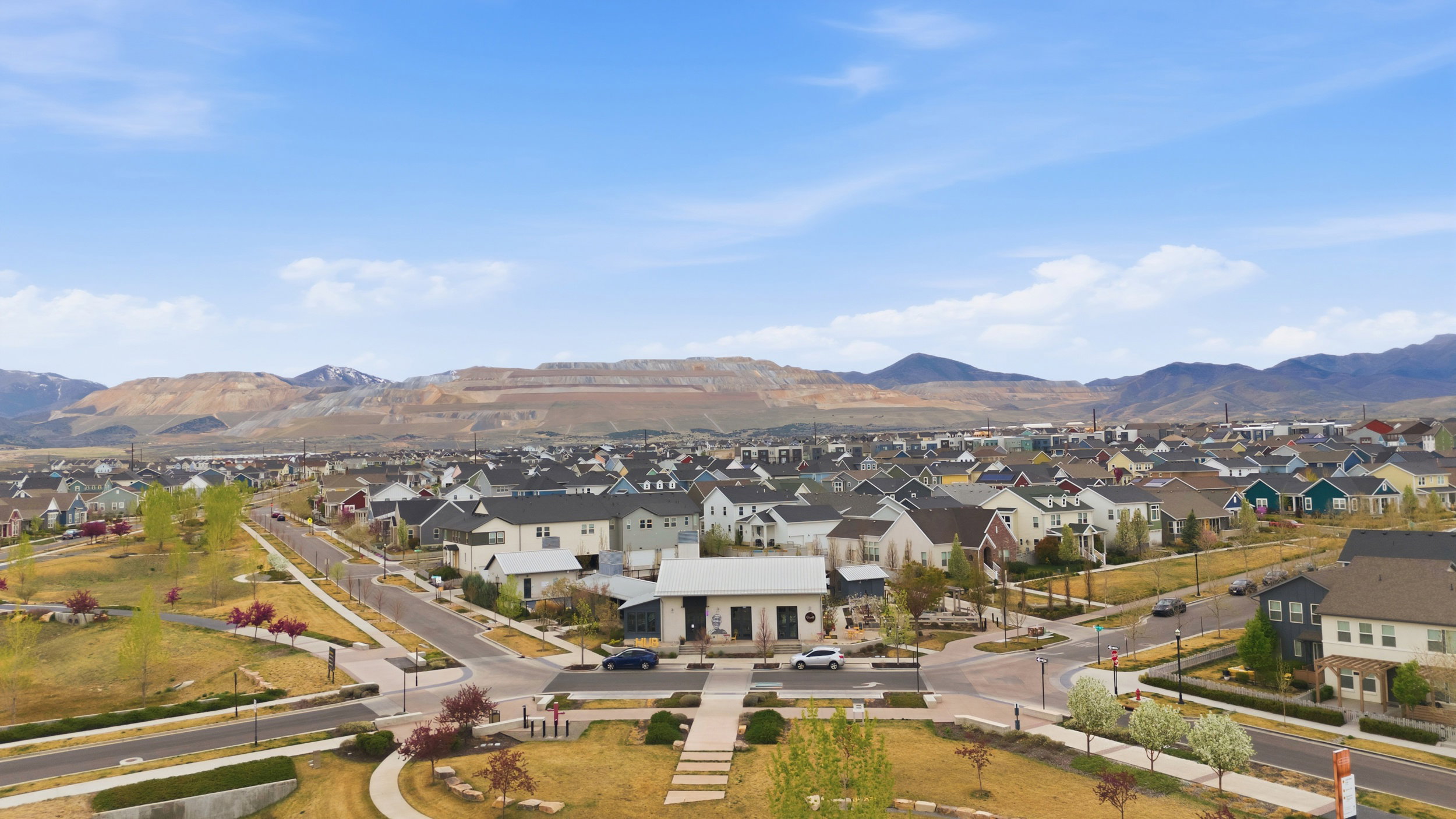 Aerial perspective of suburban area featuring mountains