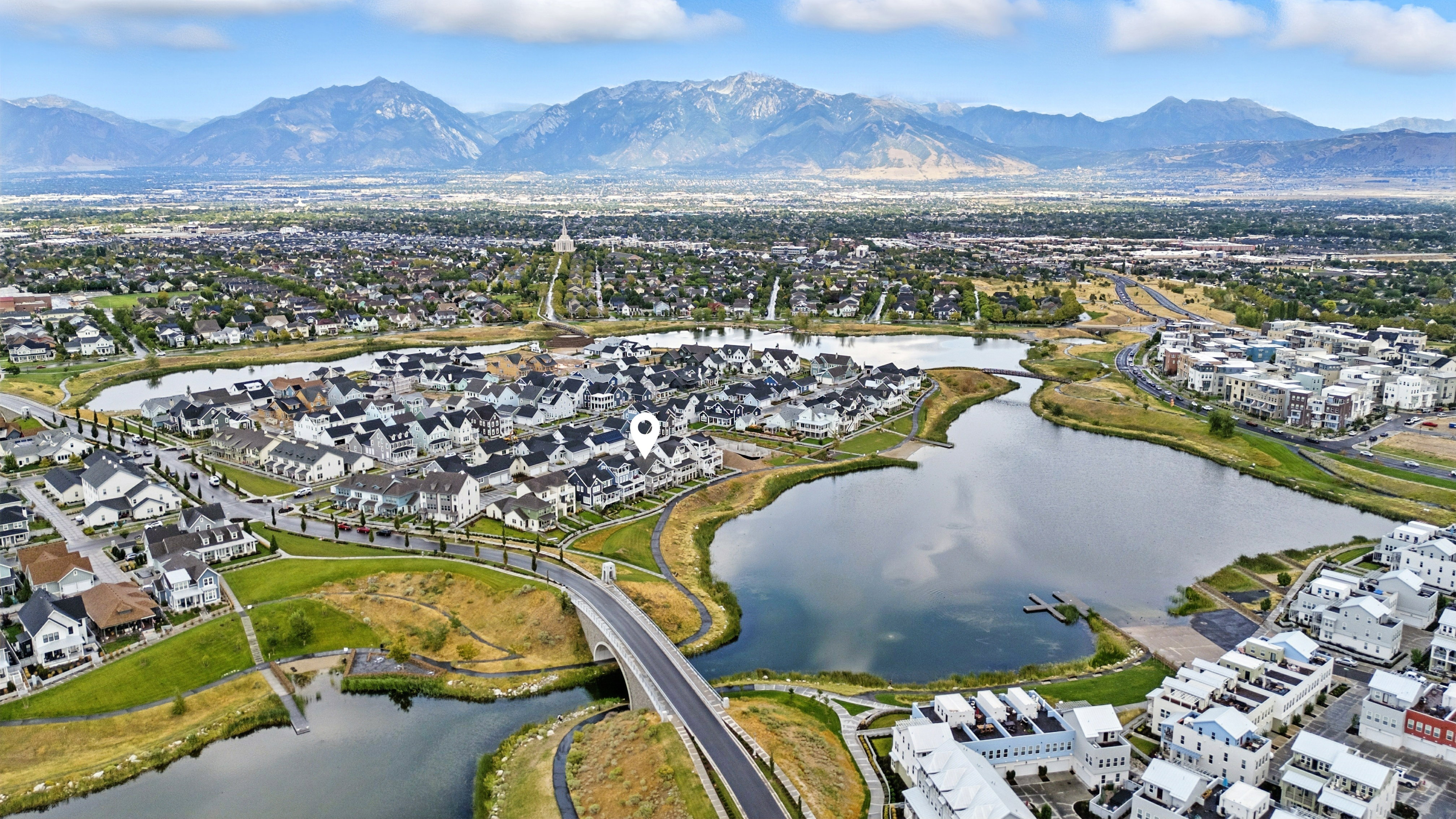 Aerial view of residential area with a water and mountain view