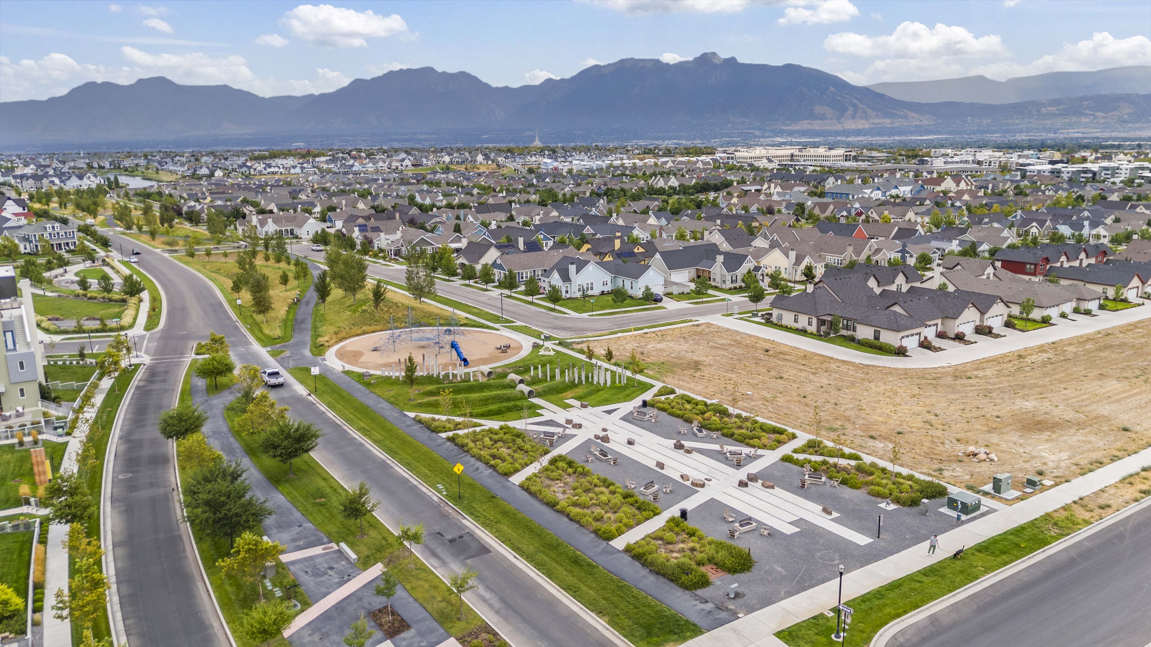 Aerial view of residential area with a mountainous background