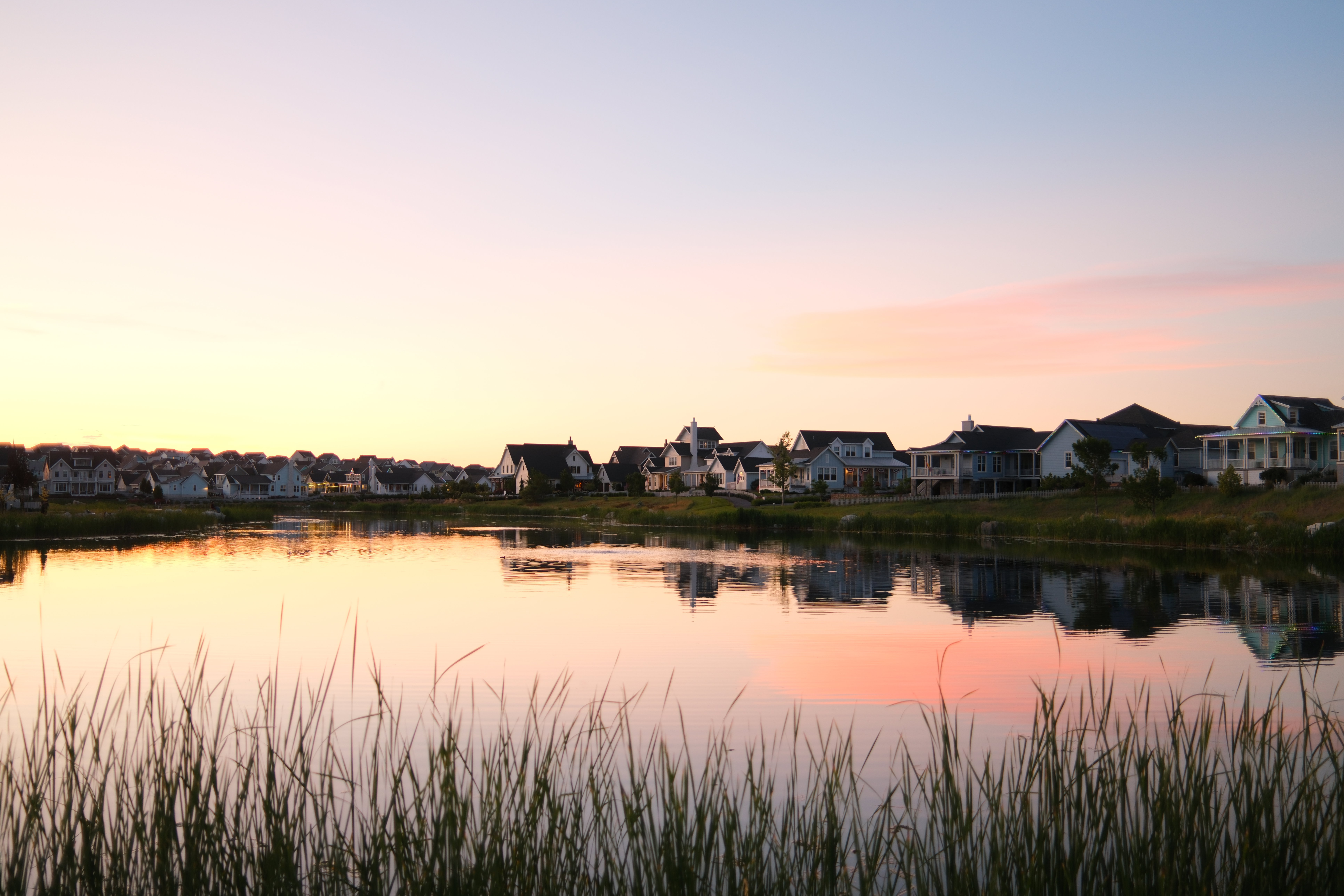 Water view with nearby suburban area