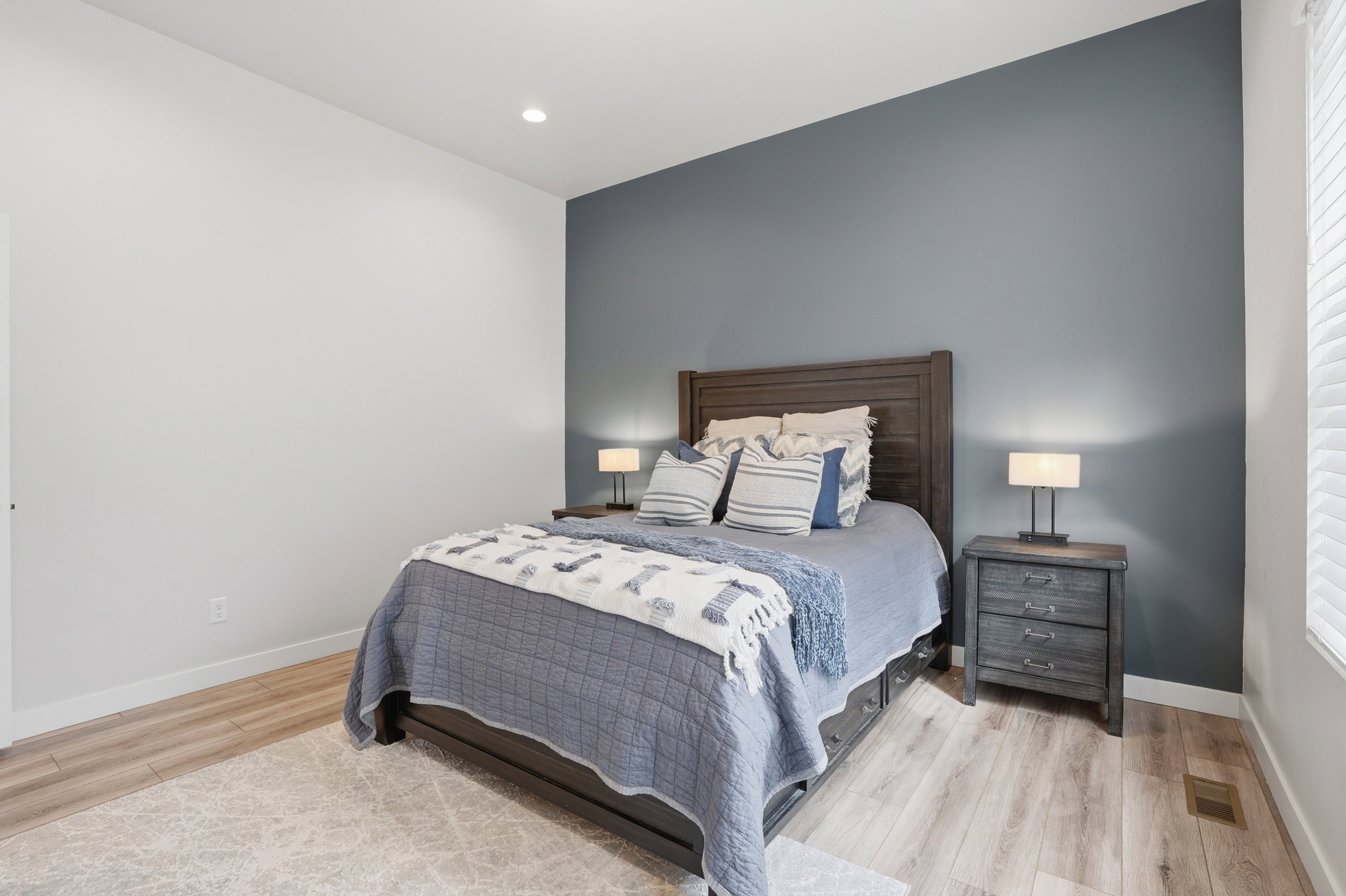 Bedroom featuring light wood-type flooring and recessed lighting