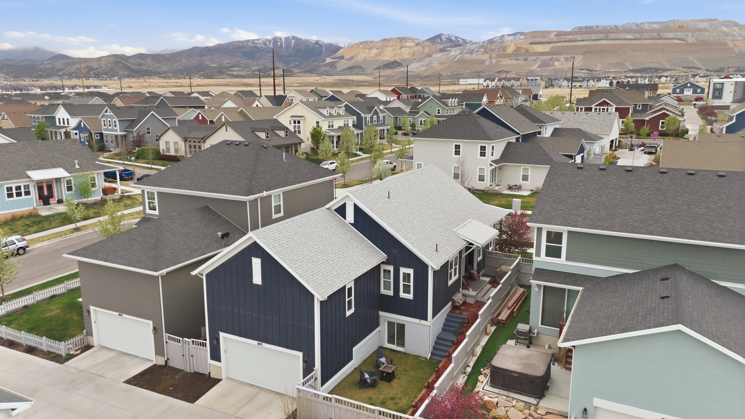 Aerial view of residential area with a mountain backdrop