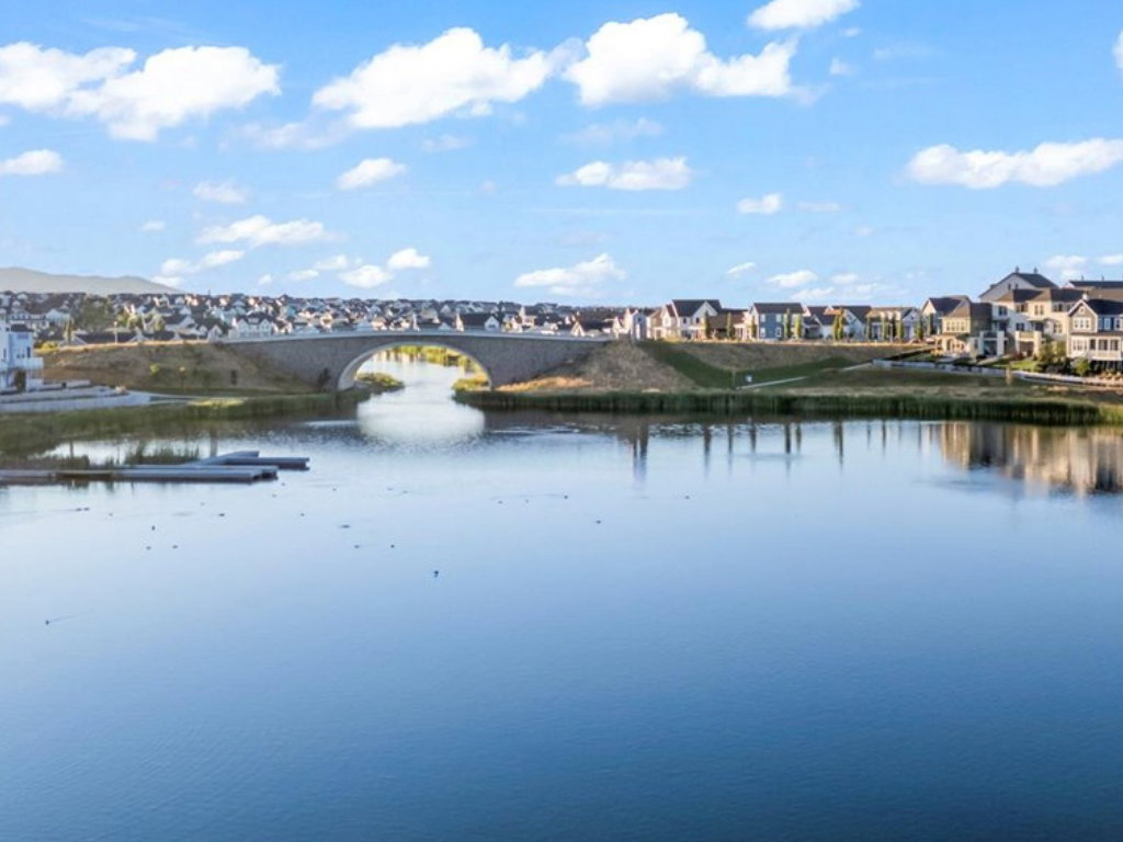 Water view with nearby suburban area