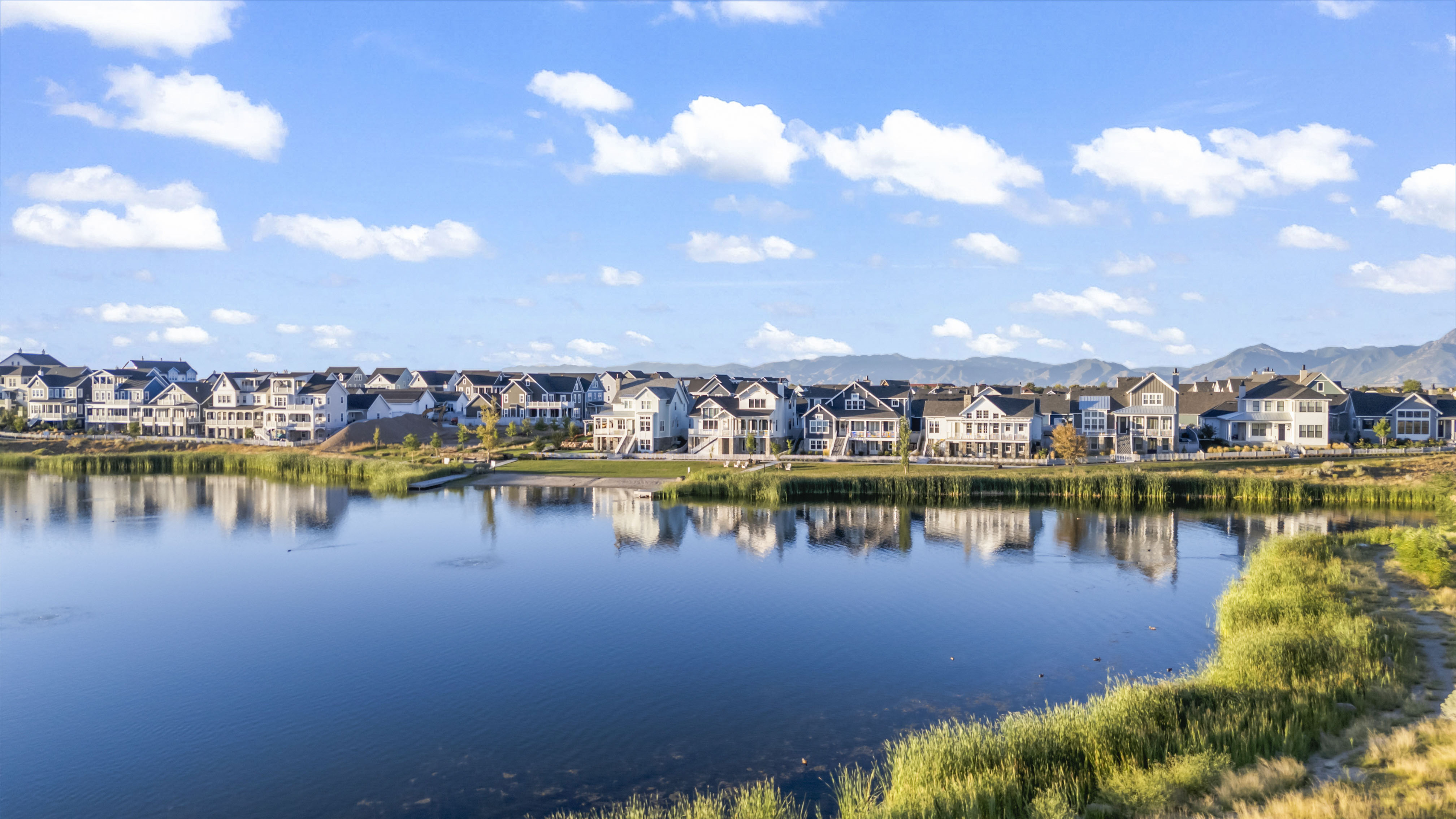 Water view featuring nearby suburban area