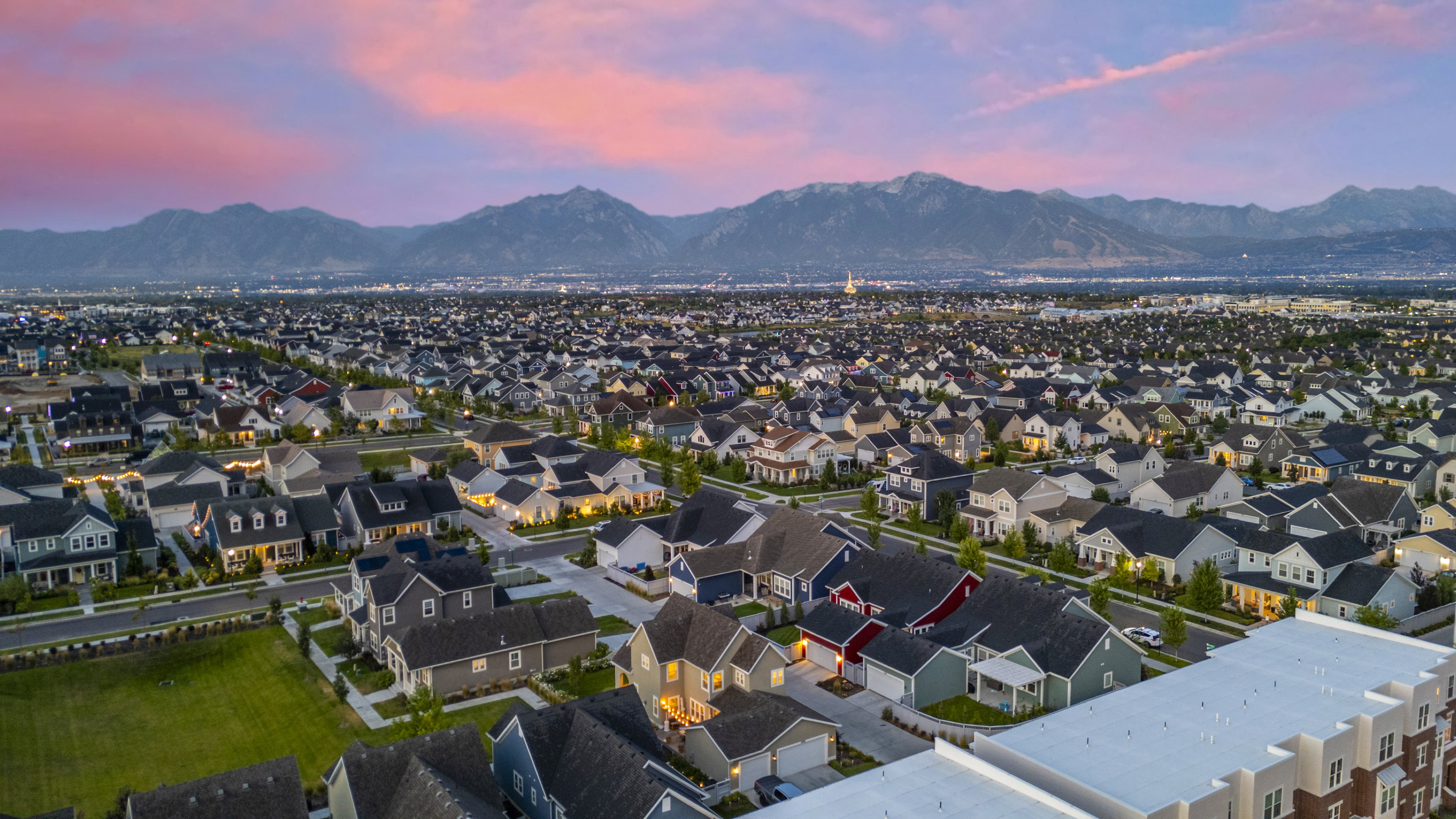 Aerial view at dusk of a mountain view and a residential view