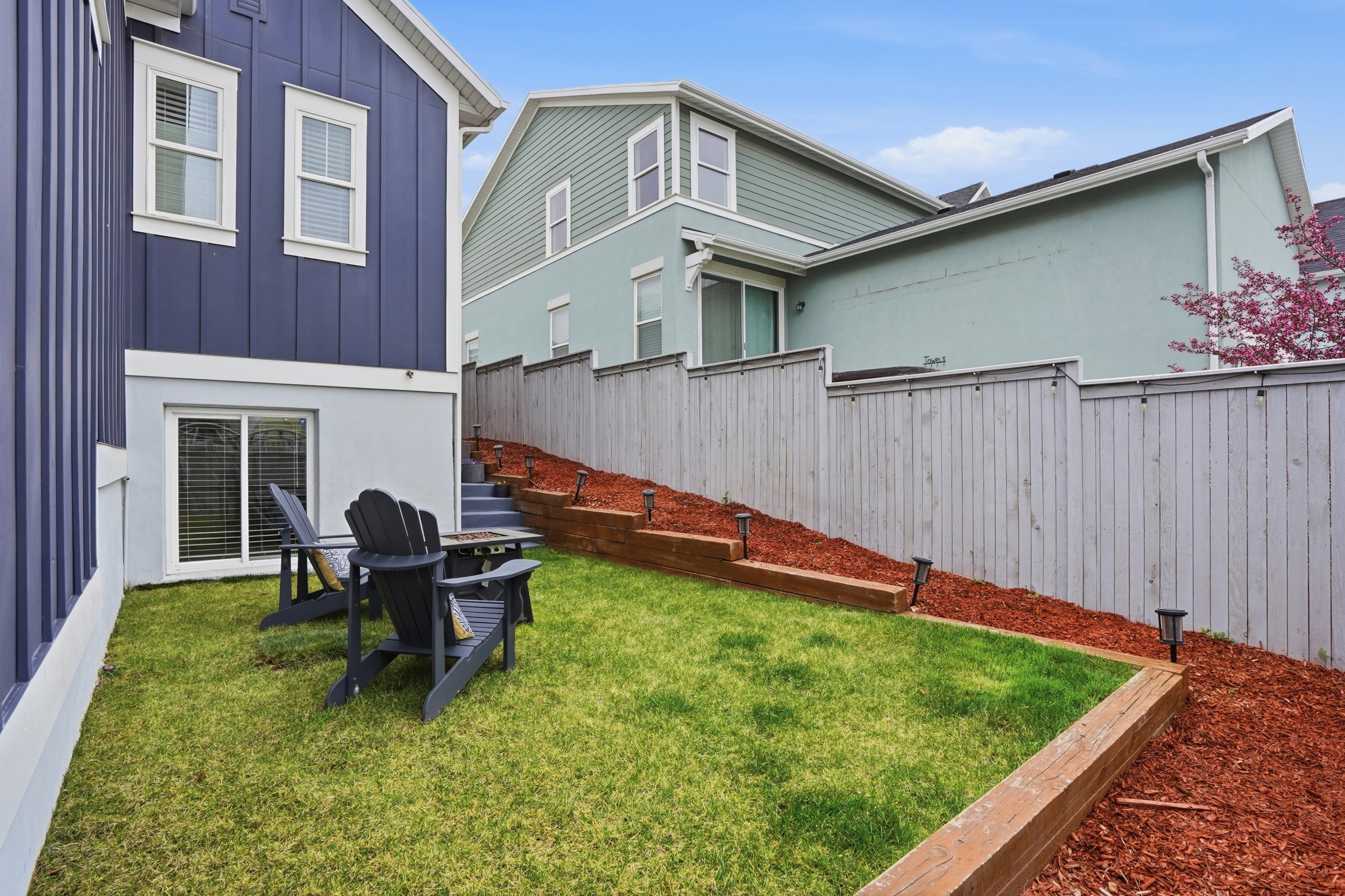 View of fenced backyard