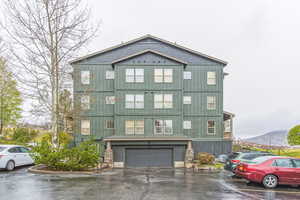 View of front of property featuring board and batten siding
