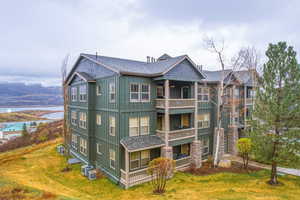 View of property featuring a water view