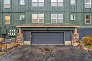 Garage featuring driveway