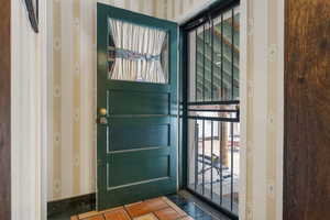 Entry off kitchen - access to covered patio / pool area